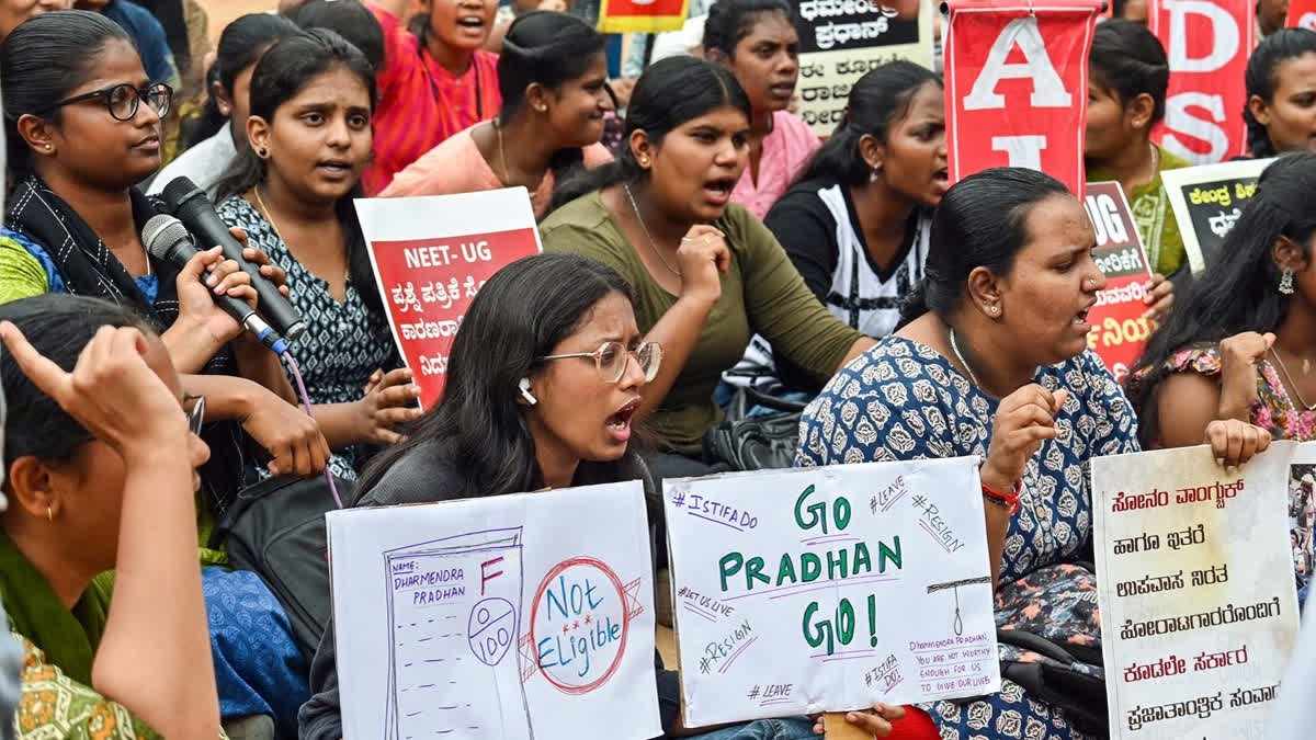Students and AIDSO activists demonstrate against Union Education Minister Dharmendra Pradhan. (ANI)