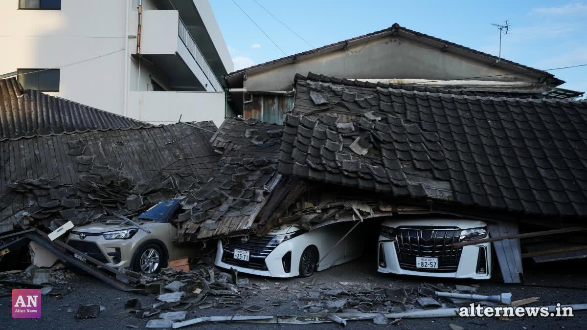 Vehicles are crushed under collapsed buildings in Yatsushiro, southwestern Japan, Wednesday, July 29, 2026, the day after an earthquake hit the area. (AP)