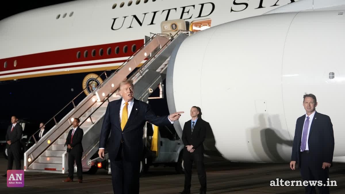 Surrounded by security, President Donald Trump switches planes at U.S. Air Force Base, RAF Mildenhall in Suffolk Eastern England, on his way back to Washington from the NATO summit in Ankara, Turkey, Wednesday, July 8, 2026. (AP)