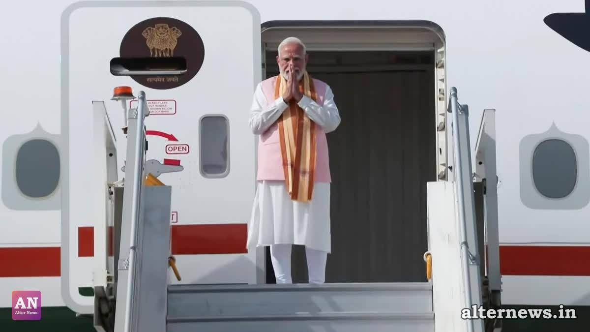 In this screengrab from a video posted on Aug. 29, 2026, Prime Minister Narendra Modi gestures as he boards the flight for Tashkent, Uzbekistan, in New Delhi. (PTI)